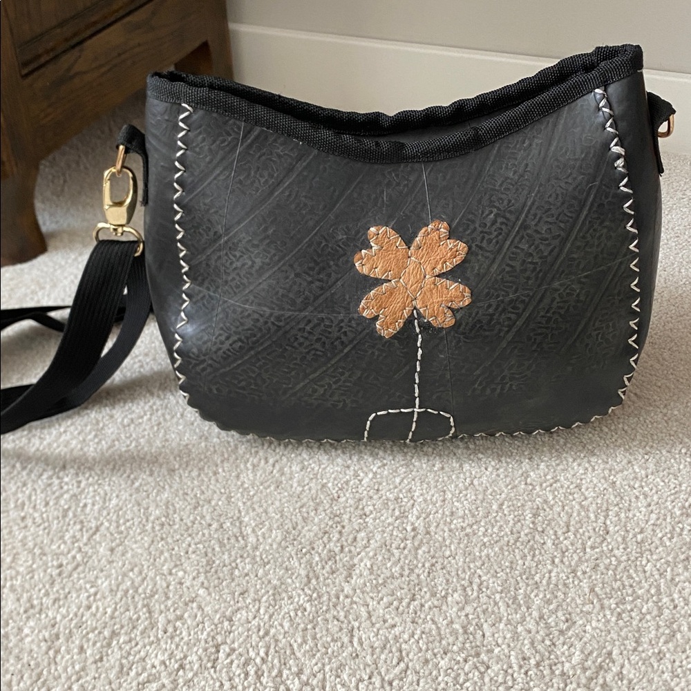 Ganesh Black and Tan Crossbody Bag with Flower Accent